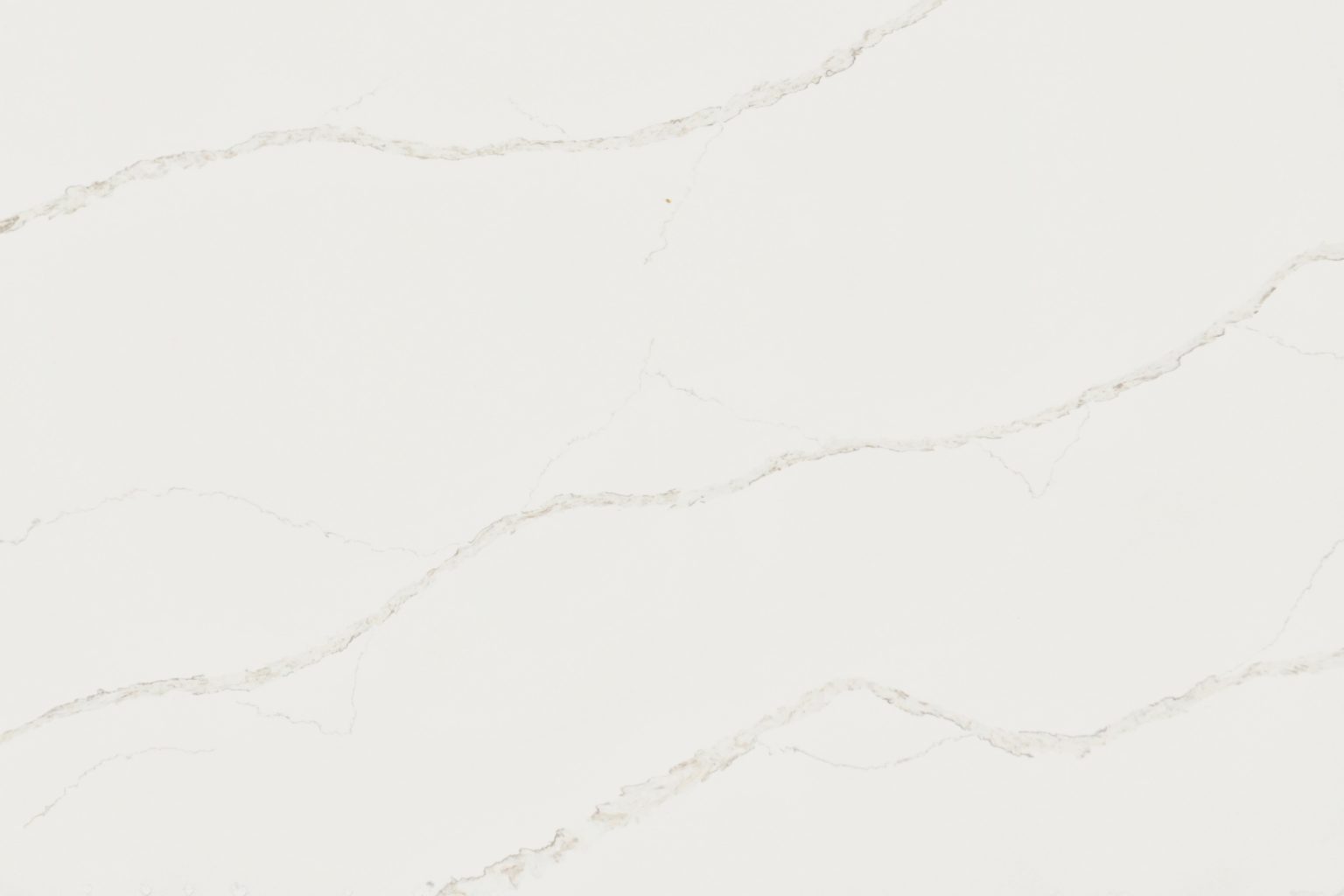 This is a Calcutta Marble like quartz surface primarily white with a ...